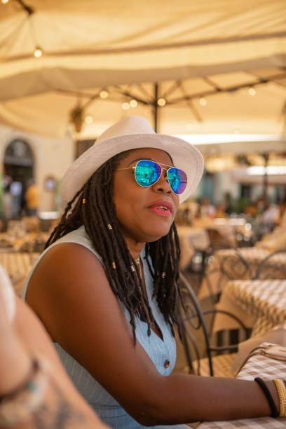 istock Luxury mature black woman sightseeing in Lucca 2161610382