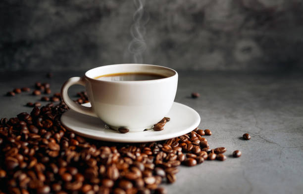 istock Coffee cup and coffee beans on  gray background, Black coffee cup aromatic 2161610833
