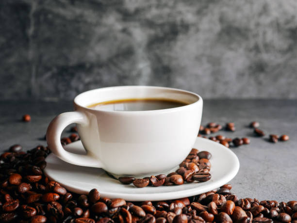 istock Coffee cup and coffee beans on  gray background, Black coffee cup aromatic 2161610901