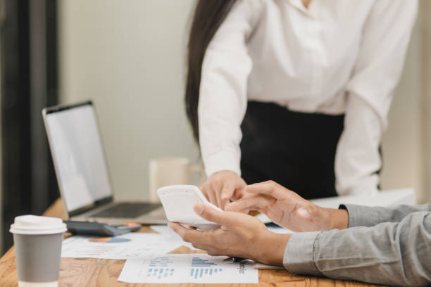istock Business partners working with analysis report and advisor showing plan. 2161615129