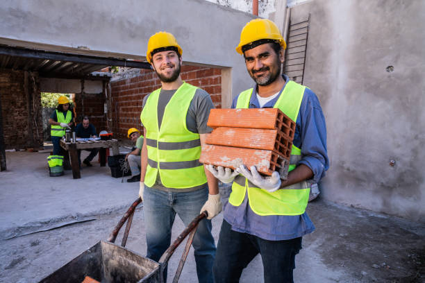 istock Portrait of construction workers working on a construction site 2161617027