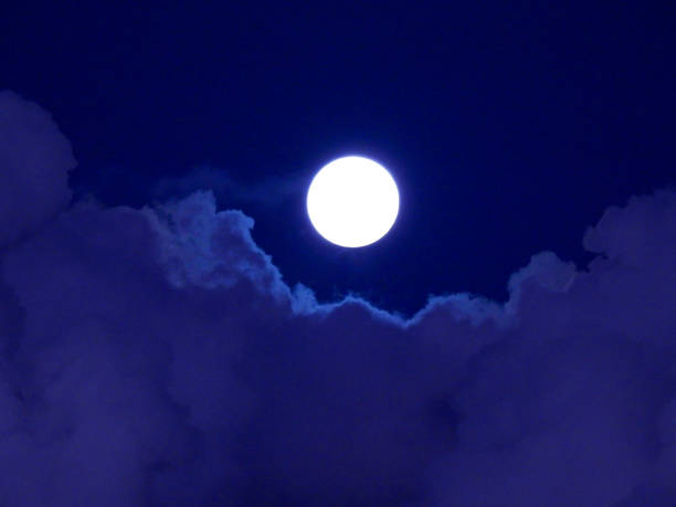 Clouds and Moon late afternoon