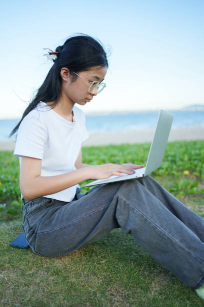 istock Asian girl using laptop 2161618908