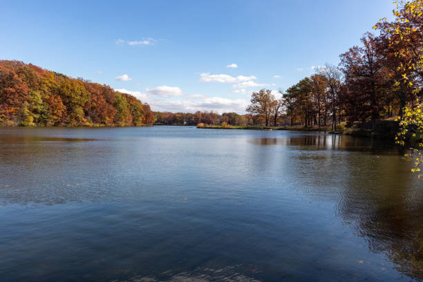 istock calm lake with autumn trees 2161621687