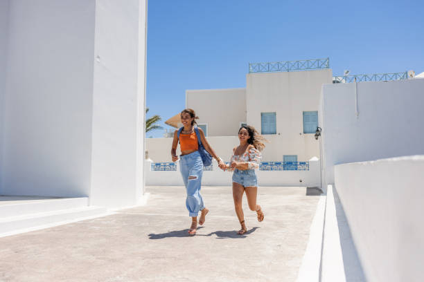 istock Tourist Friends Exploring Santorini 2161626526