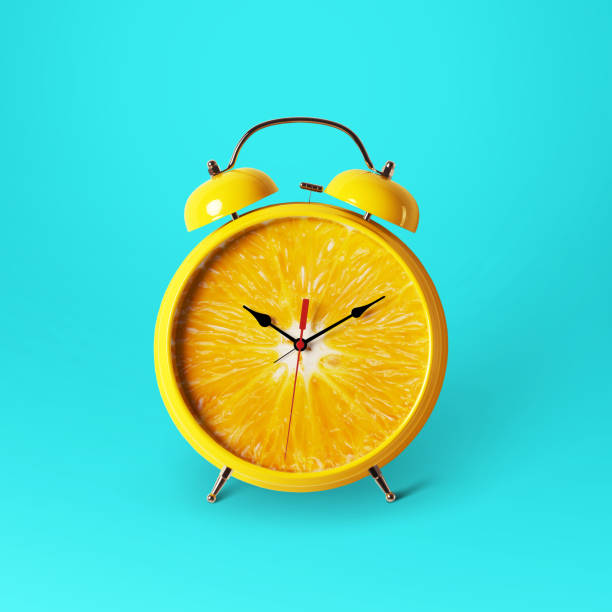 istock Creative idea layout fresh orange slice alarm clock on blue background. minimal idea business concept. Healthy lifestyle concept 2161629652