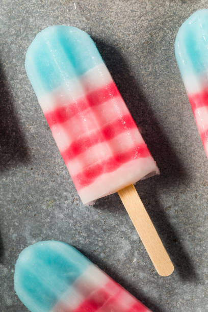 istock Patriotic Red White and Blue Popsicles 2161632424