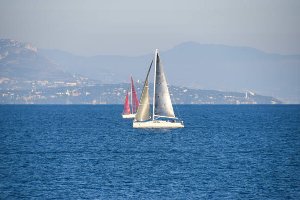 Antibes, France - January 1 2020: A sailboat on the Mediterranean Sea