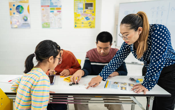istock Primary education Students and friends learning Robotics technology in classroom with teacher 2161639942