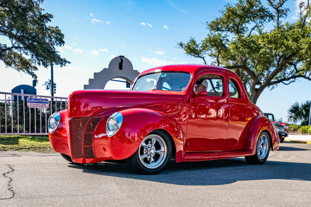 Gulfport, MS - October 02, 2023: Low perspective front corner view of a 1940 Ford Deluxe Coupe at a local car show.
