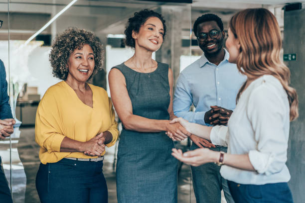 istock Business people shaking hands in the office 2161645175