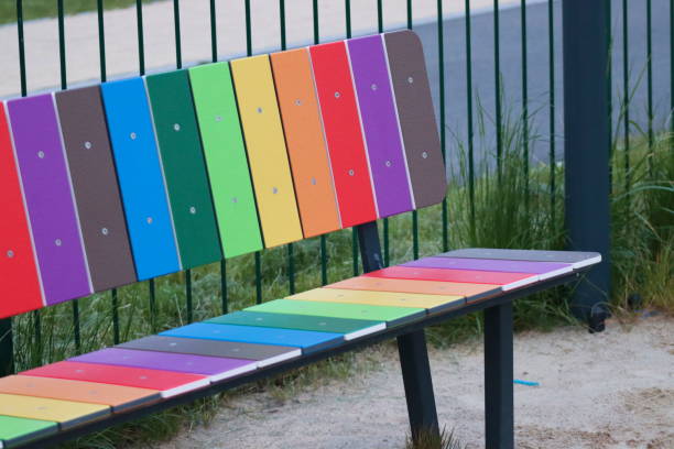 istock A bench in rainbow colors on the playground 2161647563