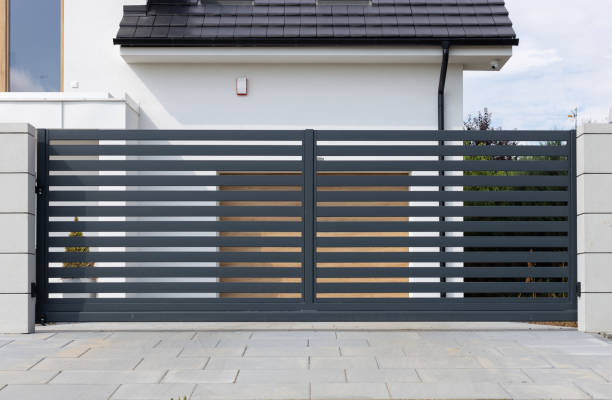 istock Modern House with Black Horizontal Fence 2161650787