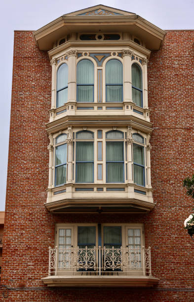 istock Victorian era brick building with bay windows 2161654641