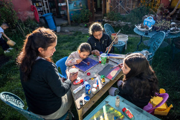 istock Children doing painting activity at children's foundation 2161655072