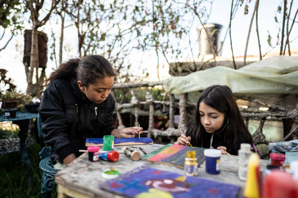 istock Children doing painting activity at children's foundation 2161655130