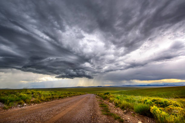 istock Storm clouds over green prairie 2161658007