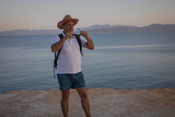 A tourist explores a seaside tourist destination