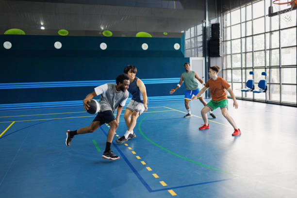 istock Active friends playing a sports game indoors 2161662308