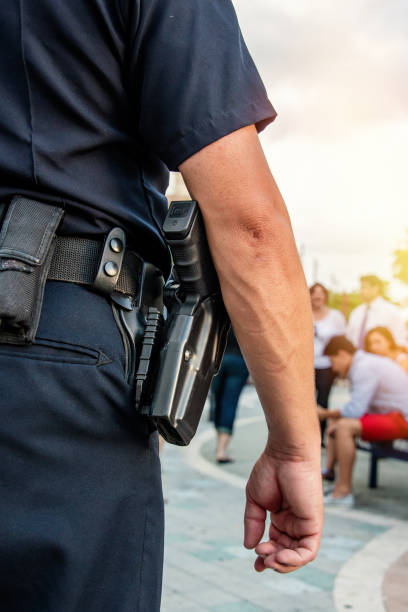 istock Law enforcement officer watching the streets 2161665308