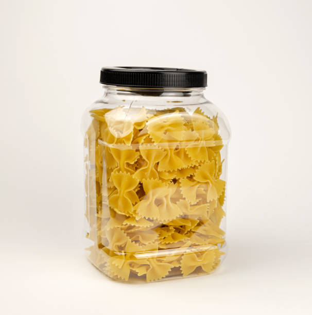 istock Farfalle Butterfly pasta. Bow pasta in a plastic storage container. 2161665440