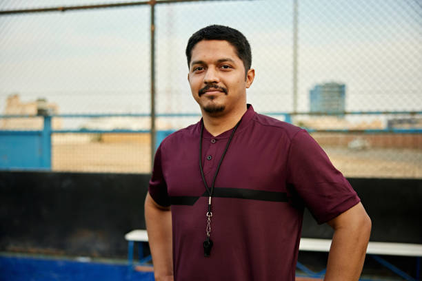 istock Confident male soccer coach on field 2161667685