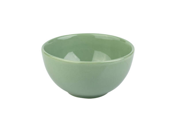 istock Green ceramic bowl isolated over white background 2161669947