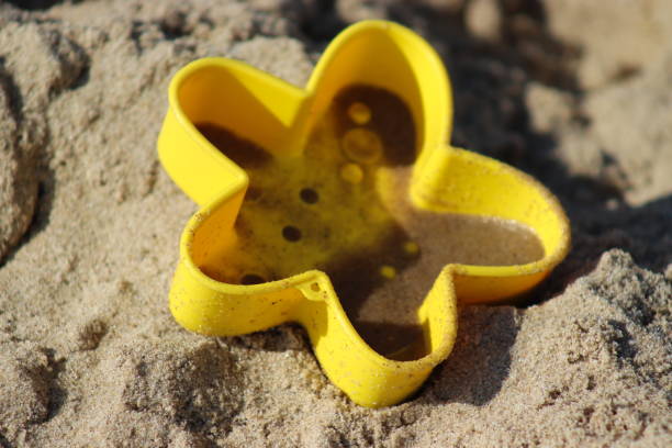 Children's sand toys on the beach.