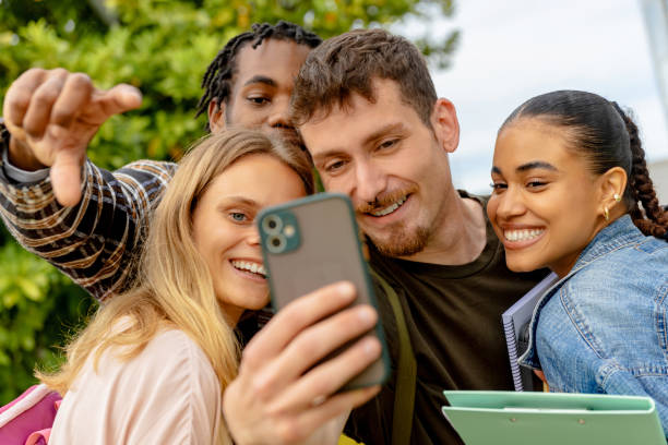 istock multiracial group of students on campus 2161678063