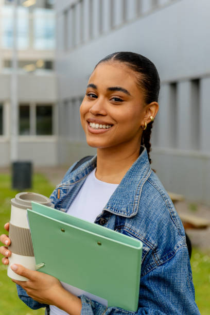 istock portrait of Latina student on campus 2161678066