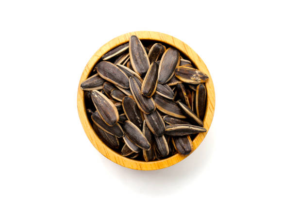 istock Roasted sunflower seeds on white background. 2161680426