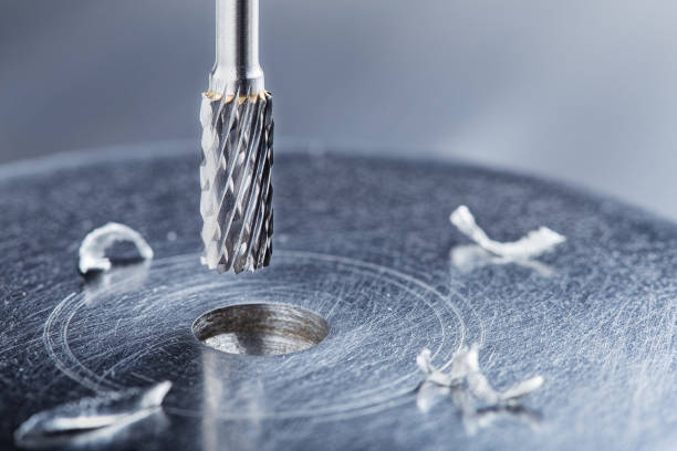 istock Milling cutter make sink in hole in steel billet. Locksmith work. 2161683537