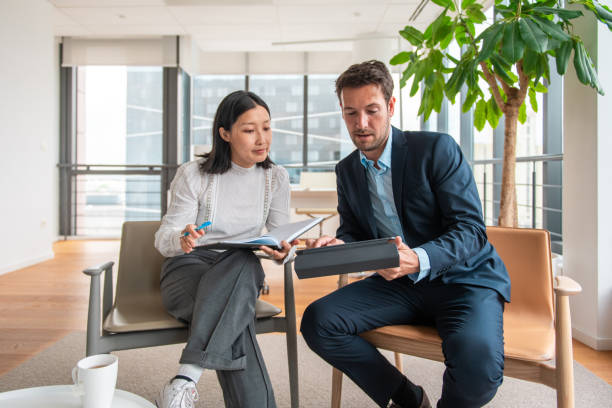 istock Diverse Financial Experts Collaborating in Modern Office Space 2161684986