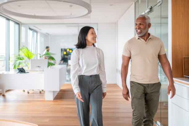 istock Senior Hispanic Man Visits Financial Advisor's Office 2161684992