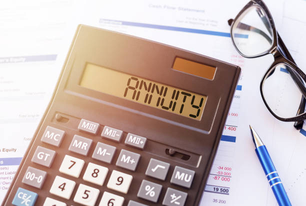 istock Annuity Concept Displayed on Calculator With Financial Documents in Office Setting 2161685840
