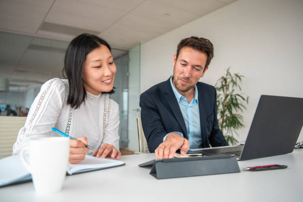 istock Diverse Financial Advisors in Collaborative Discussion 2161686527