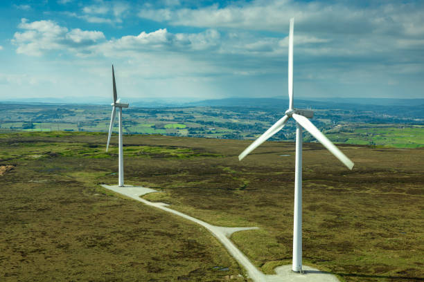 istock Two Large Wind Turbines on Moor in West Yorkshire 2161694070
