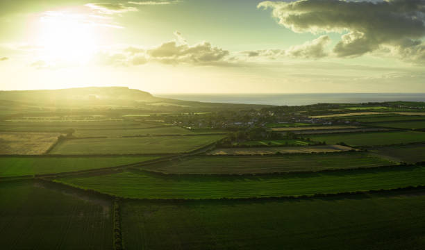 Aerial shot of rural scenery near the village of Ellerby in North Yorkshire, England on a summer evening.