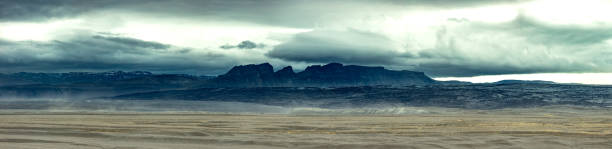 Dramatic Panoramic Vista in Iceland with Mountains in Silhouette