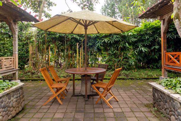 istock Table and chair with umbrella outdoor 2161697614