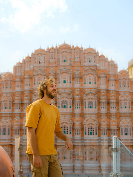 istock Man looking at Hawa Mahal in Jaipur, India 2161698598