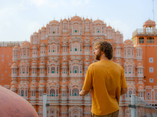 istock Man looking at Hawa Mahal in Jaipur, India 2161698603