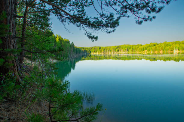 istock Turquoise lake and clay shores. 2161709830