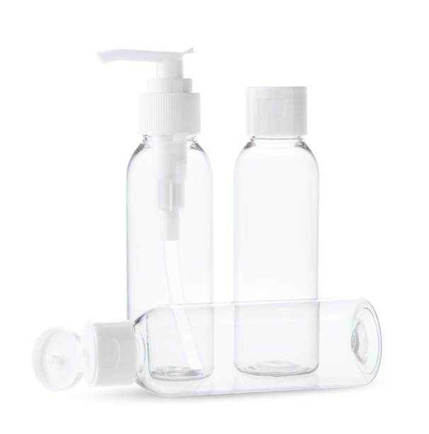 istock Three Clear Plastic Bottles With White Caps and Pumps on a White Background 2161711749