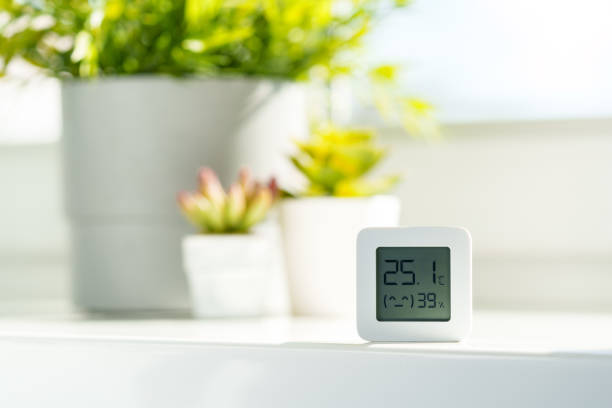 istock White Digital Thermometer Displaying Room Temperature and Humidity 2161712226