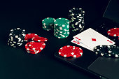 red-and-black-casino-chips-on-a-table-wi
