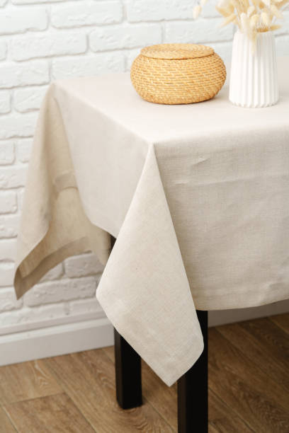istock White Brick Wall With Beige Tablecloth and Basket 2161715087