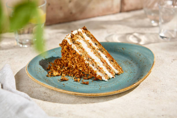 istock Slice of Authentic Carrot Cake in Sunlit Still Life Setting 2161717938