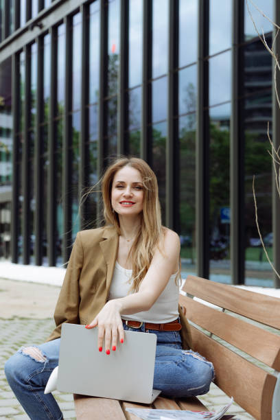 istock Woman working outdoors in the city 2161718848