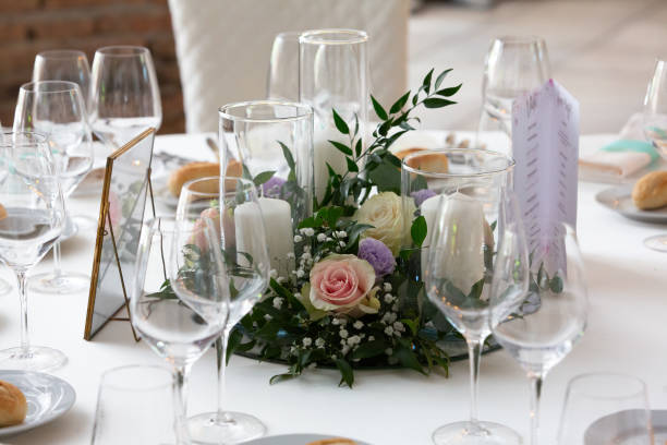 istock Round table decorated with flower arrangement for wedding reception 2161722006
